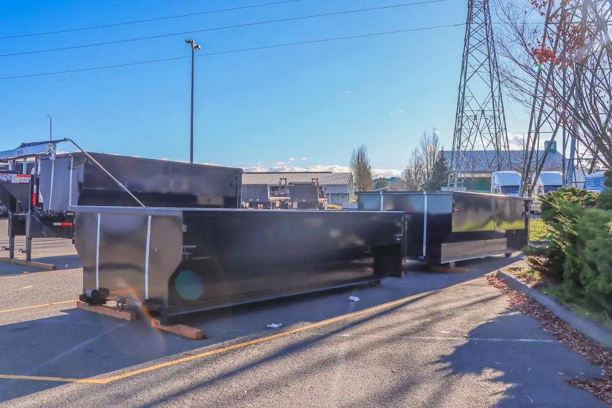Roll-off dumpster ready for waste disposal at job site for Construction Dumpster Rental in Davenport